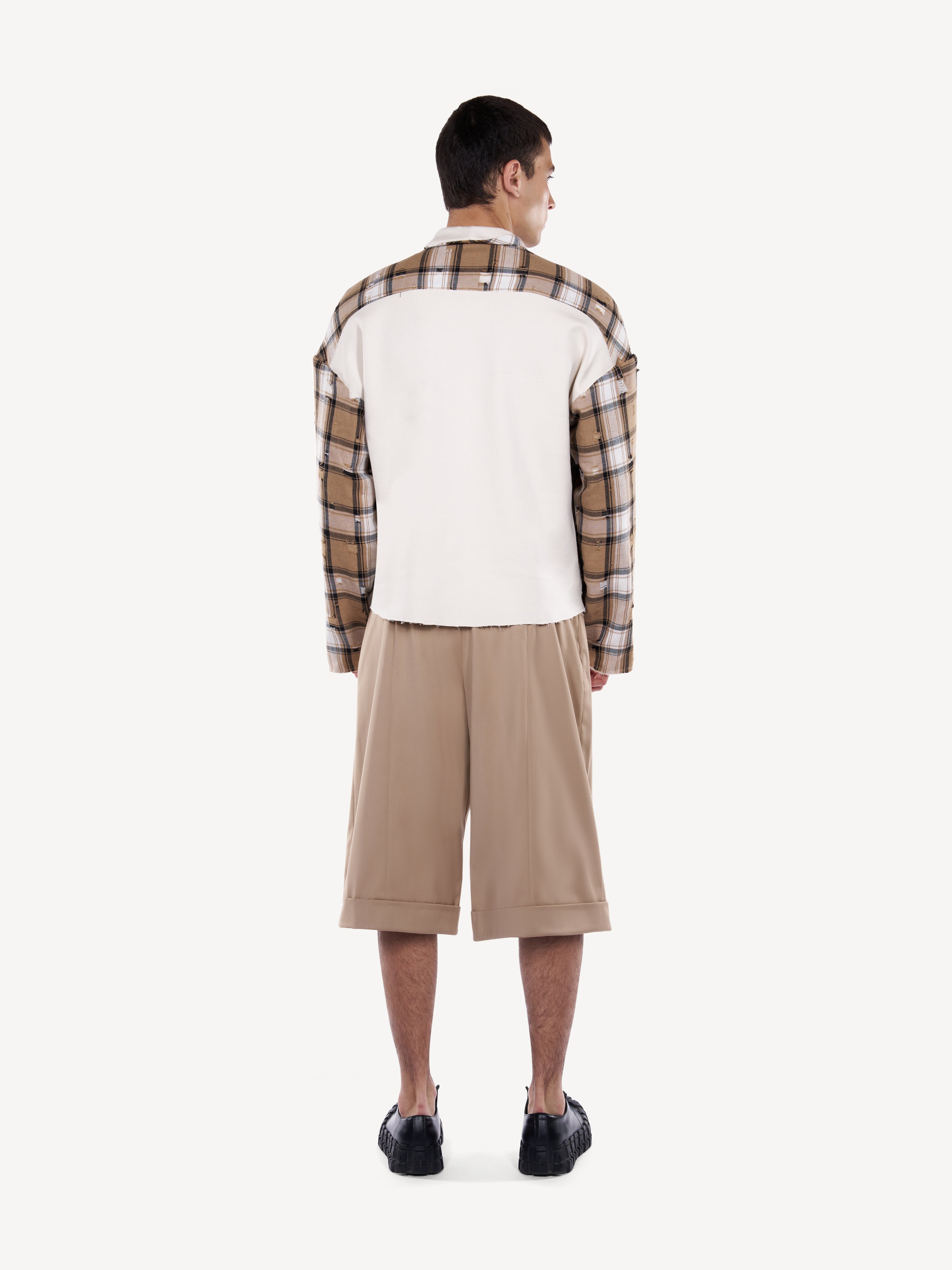 Pantaloni crop cu inchidere pe picior