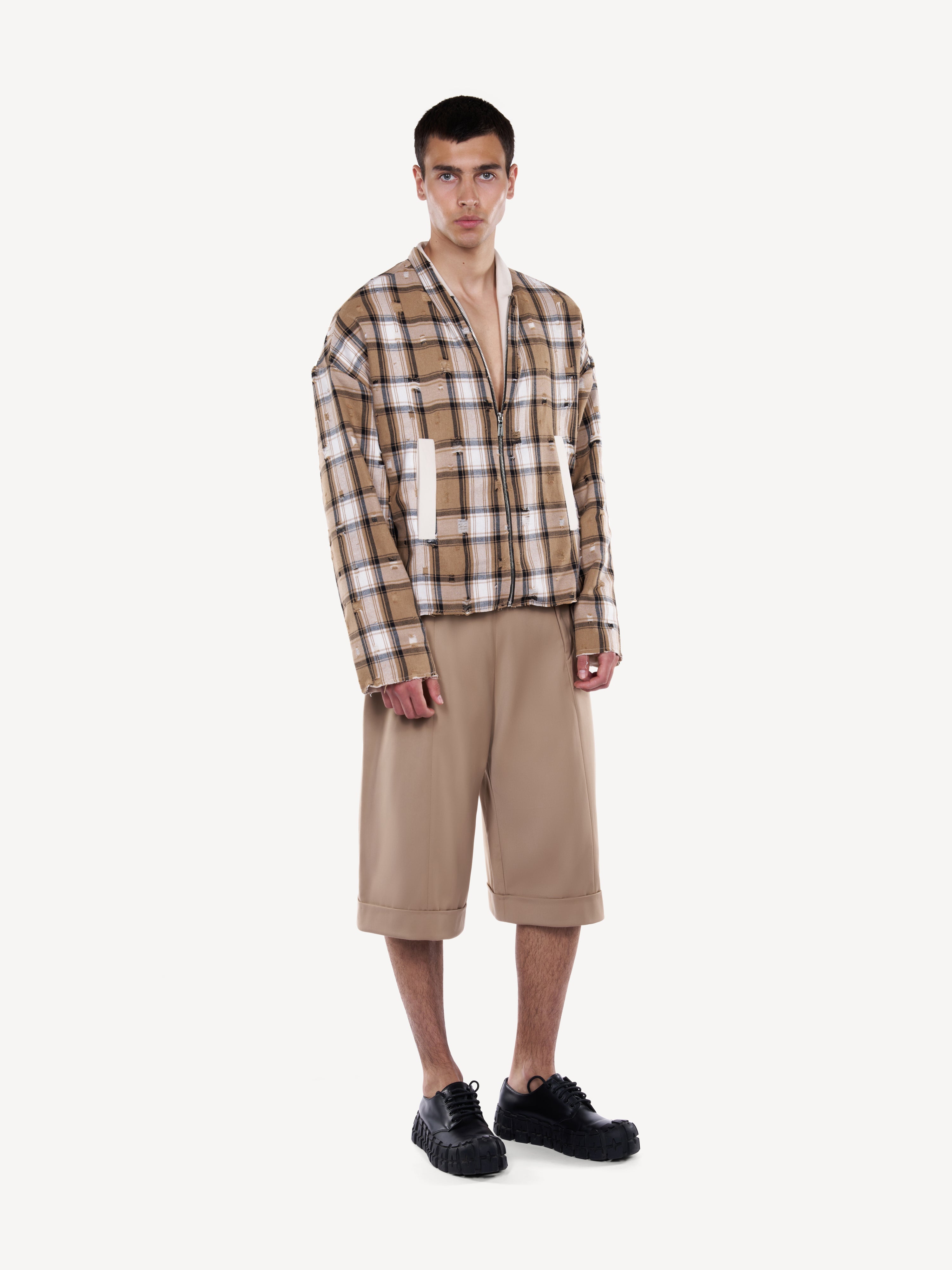 Pantaloni crop cu inchidere pe picior
