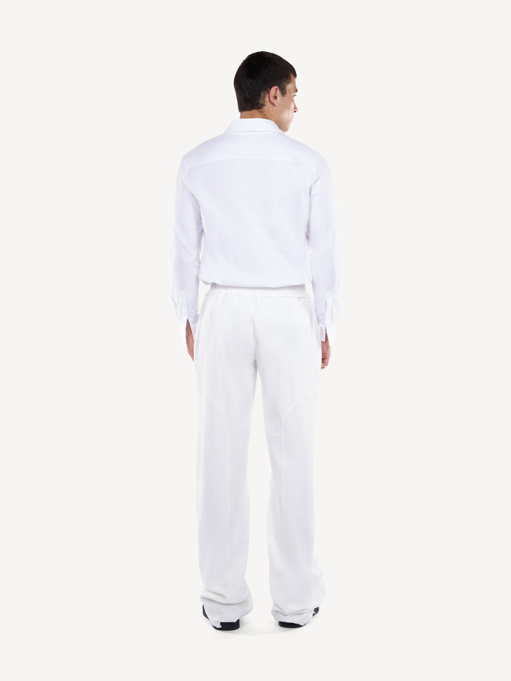 Pantaloni wide-leg albi cu buzunare cargo