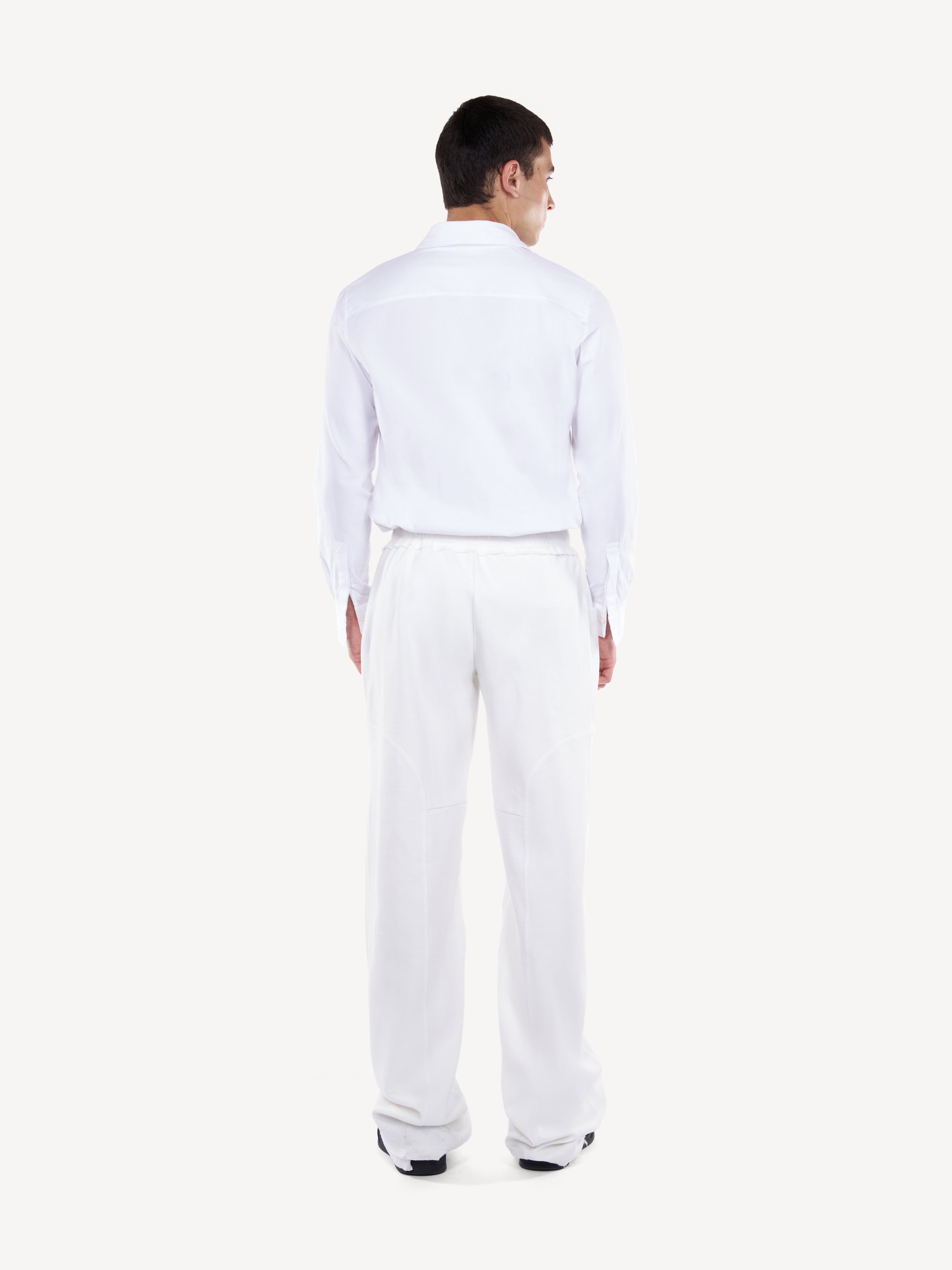 Pantaloni wide-leg albi cu buzunare cargo